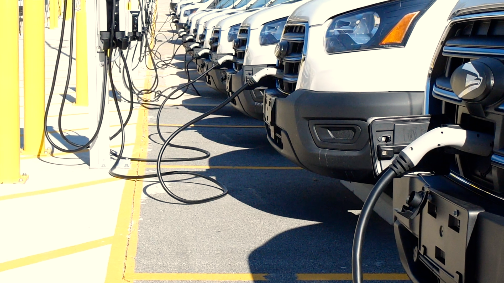 Check out the new electric postal vans and charging stations