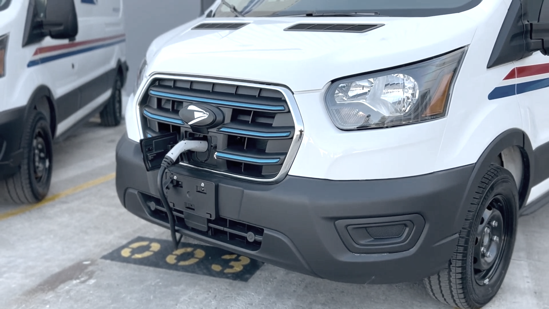 Check out the new electric postal vans and charging stations