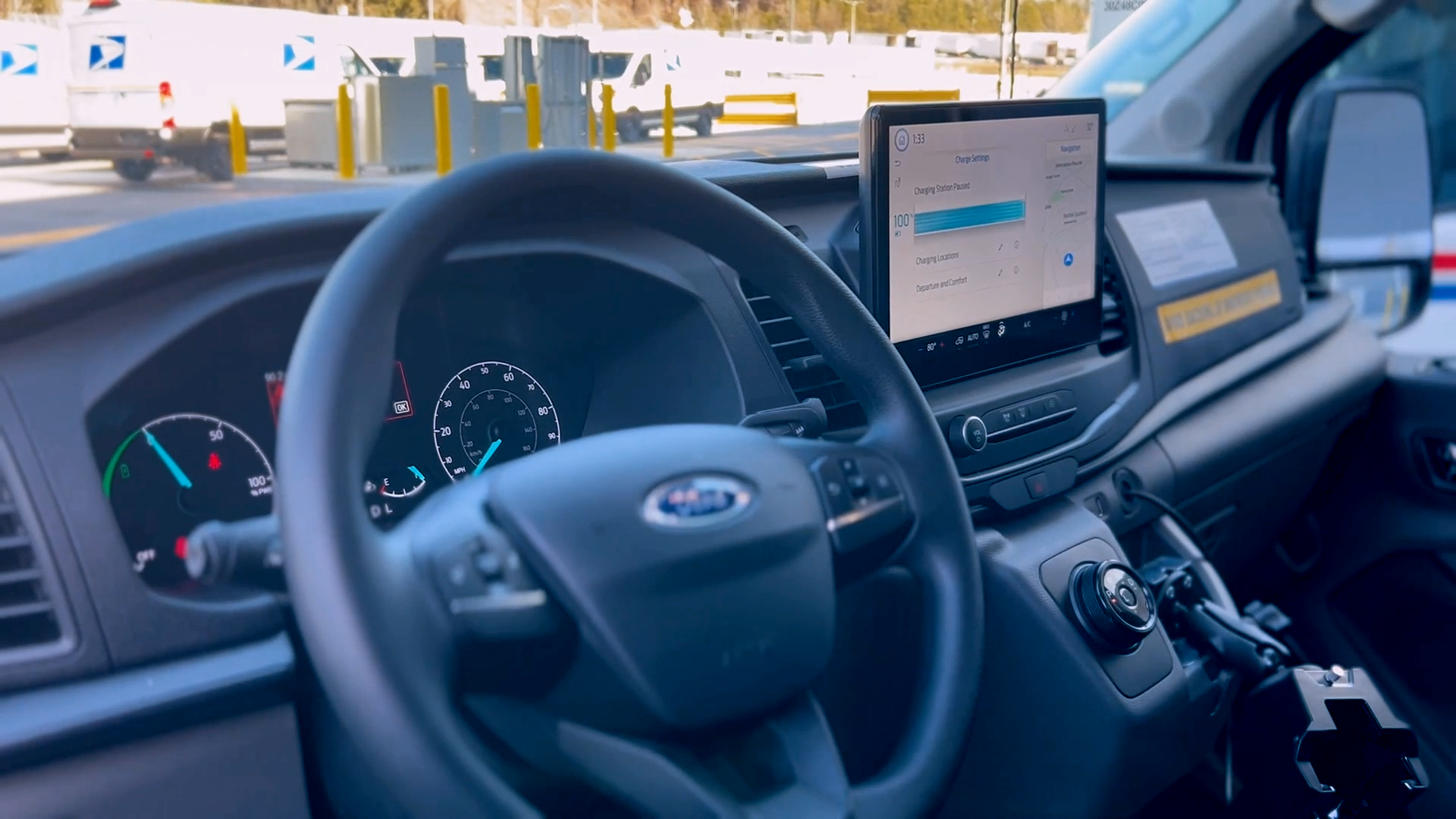 Check out the new electric postal vans and charging stations